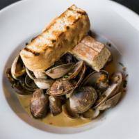 Pacific Manila Clams · Garlic, red chili flakes, parsley, lemon, white wine-butter sauce.