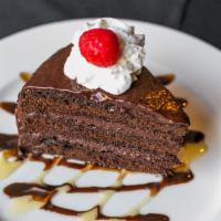 Three Double Layer Chocolate Cake · This is crazy rich, moist, and decadent layers of devil's food chocolate filled with chocola...