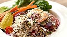 Yum Woon Sen · Gluten-free. Bean thread noodle salad, minced pork, shrimp, red onions, cherry tomatoes, gre...