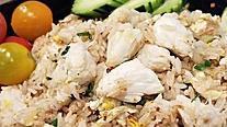 Crab Fried Rice · Gluten free. Stir-fried jasmine rice, egg, lump crab meat with garlic topped with green onio...