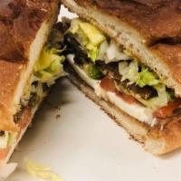 Torta With Meat · Toppings: refried beans, lettuce, tomato, onion, avocado, jalapeño,&  queso fresco.