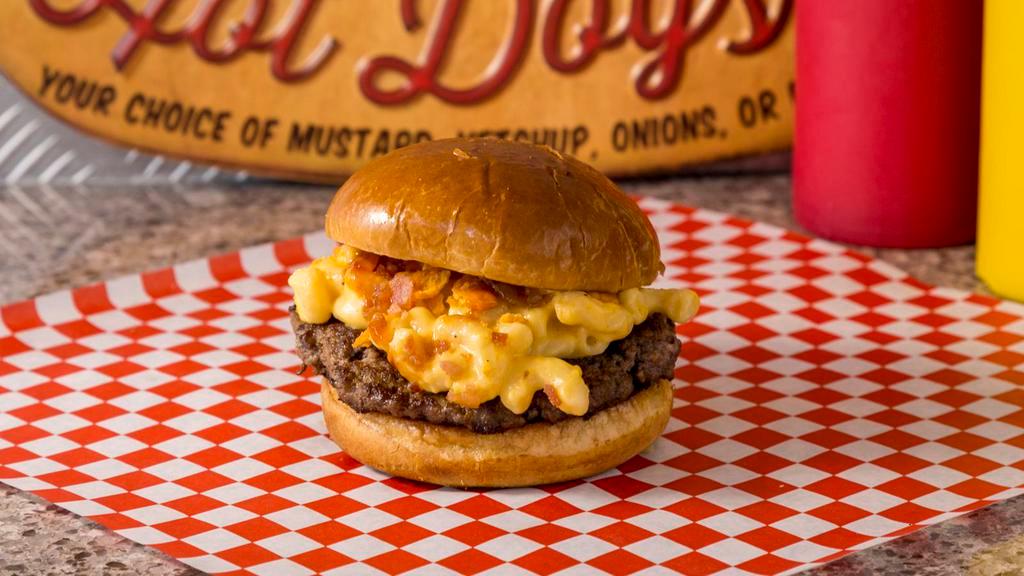 Mac N’ Cheese Burger · Mac n' cheese, cheese crackers, bacon bits and your choice of additional toppings.