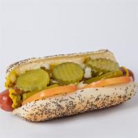 Chicago Dog - Mugsy Style · Mugsy dog, poppy seed bun, relish, mustard, tomato, onions, sport peppers, pickles chips and...