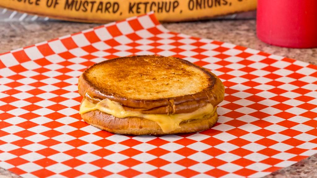 Grilled Cheese · Grilled hamburger bun with American cheese.