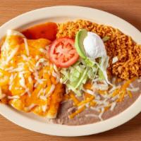 6 Enchiladas Plate · Three enchiladas covered in red sauce (unless green is chosen in the sauce option), melted c...