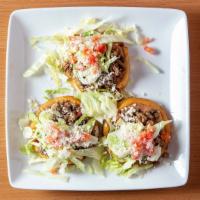 23 3 Sopes · Sope, beans, meat, lettuce, tomato, cheese, sour cream.