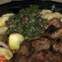 Pita Valley Combo · Includes any 4 skewers, hummos, baba, tabouli, 3 grape leaves, rice,pickles and salad.