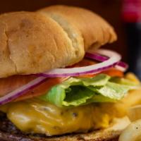 Deluxe Burger  · 1/3 lb. herbed lettuce, tomato, onion and pickle.