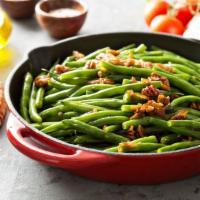 Green Beans · Made with bacon onions and herbs.