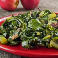 Collard Greens · Tendered with bacon and brisket bits with a spark of red pepper.