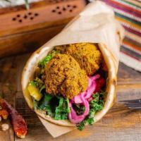 Pita Vegan Falafel · A blend of chickpeas, fava beans, fresh herbs and spices. Flash fried for a crunchy outside ...