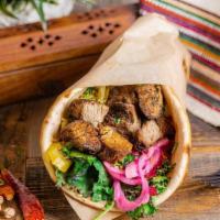 Pita Beef · Tender cuts of beef marinated in a unique blend of spices including coriander, cumin, and ca...