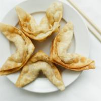 Crab Wonton (4) · Crab meat, cream cheese wrapped with crispy wonton skin served with sweet and sour sauce.