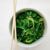 Seaweed Salad · Green wakame seaweed with sesame vinaigrette.