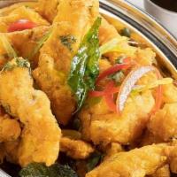Fish Amritsari · Flaky Swai fish friend crisp and spiced with chaat masala & dried mango dust served with cor...
