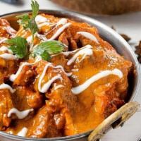 Butter Chicken · (GF). An Indian menu classic, pulled chicken charred in the tandoor oven then finished in a ...