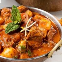 Vindaloo · (GF) (Can be made Vegetarian based on Protein selection) SPICY!! Potato, vinegar, serrano an...