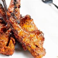 Lamb Chops · (GF) Tender chops of Lamb marinated in chef's select spices and cooked in the clay oven