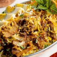 Chicken Biryani · (GF) Hearty vegetables/meat and rice casseroles cooked with flavorful herbs & spices. Served...
