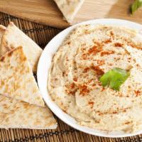 Hummus & Grilled Pita · Creamy hummus with a side of freshly grilled pita