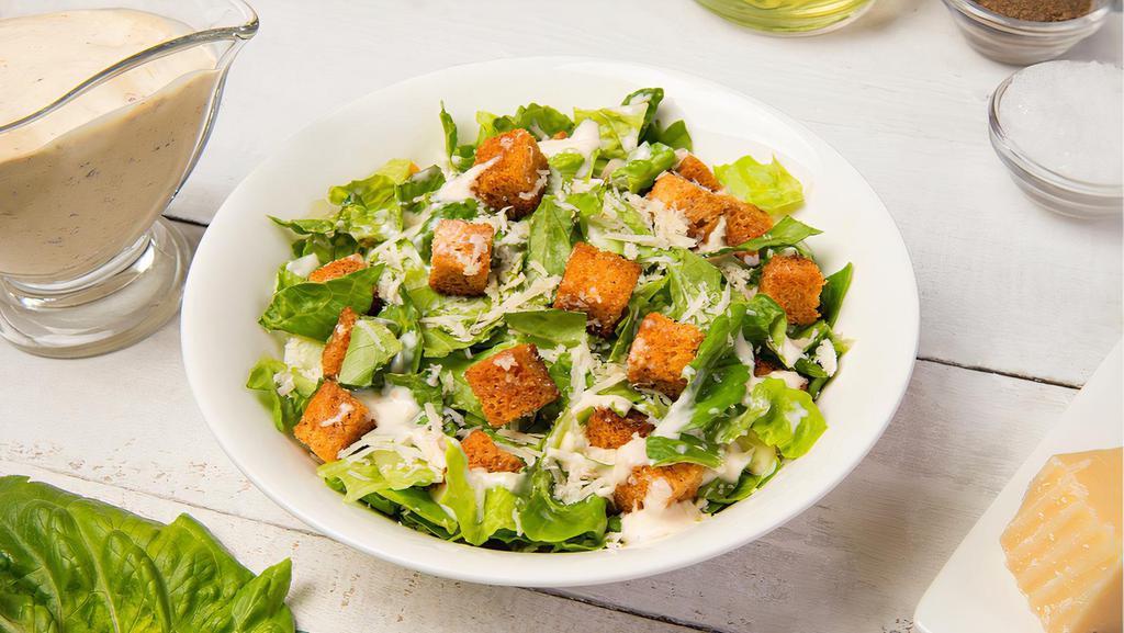 Caesar Salad · Romaine lettuce, house croutons, and parmesan cheese with Caesar dressing