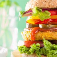 Vegan Jalapeno Burger · Plant-based patty grilled and topped with sliced vegan cheese, jalapenos, lettuce, tomato, o...