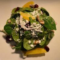 Spinach Salad  · dried cranberries, roasted pistachios,
oranges, shallots, feta,
Gran Marnier vinaigrette