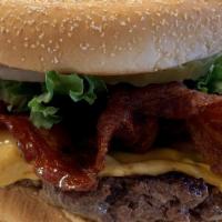 Bacon Cheeseburger · 1/3 pound burger with cheddar cheese and bacon.  Comes with ketchup, mayo, must, pickle, oni...