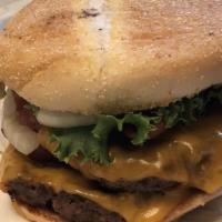 Avocado Bacon Burger · 1/3 burger with cheddar cheese and bacon.  Comes with Avocado spread, onion, tomato, lettuce