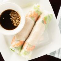 Goi Cuon Tom Thit (2) · Fresh springrolls wrapped with shrimp, pork or both. Dipping sauce is topped with peanuts wh...