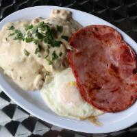 B & G Breakfast · Delightful buttermilk biscuit smothered in Scrambled’s original sausage gravy. Served with o...