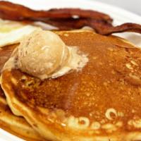 Cakesss Breakfast · Two house buttermilk pancakes topped with cinnamon butter. Served with one egg and your choi...