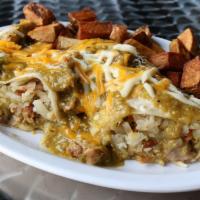 Claudia'S Pork Chile Verde Burrito · Fresh Pork Chile Verde, potatoes, onions and mozzarella cheese. Served with hash browns or C...