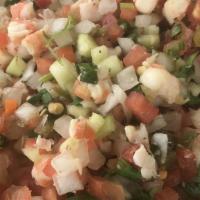 Tacos De Camarón O Pescado (3) · Shrimp taco with cilantro, onions, avocado, and lime or breaded fish taco with mayonnaise, l...