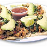 Tacos De Asada O Pollo (4) · Soft tortillas filled with seasoned steak or chicken with sauteed onions and tomatoes. Serve...