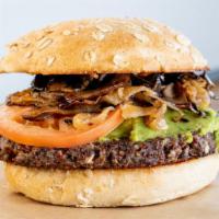 The Veg Out · Vegetarian. Veggie quinoa burger with grilled mushrooms, caramelized onions, tomato and fres...