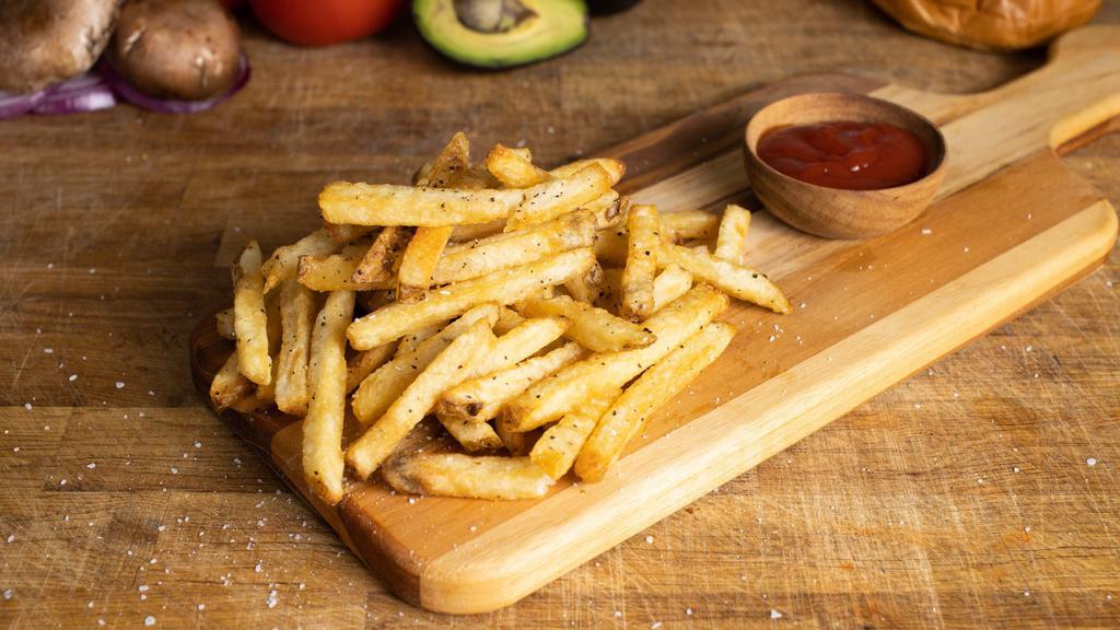 Finger Lickin' Fries · Idaho potatoes fried until golden crisp. Your choice of seasoning.