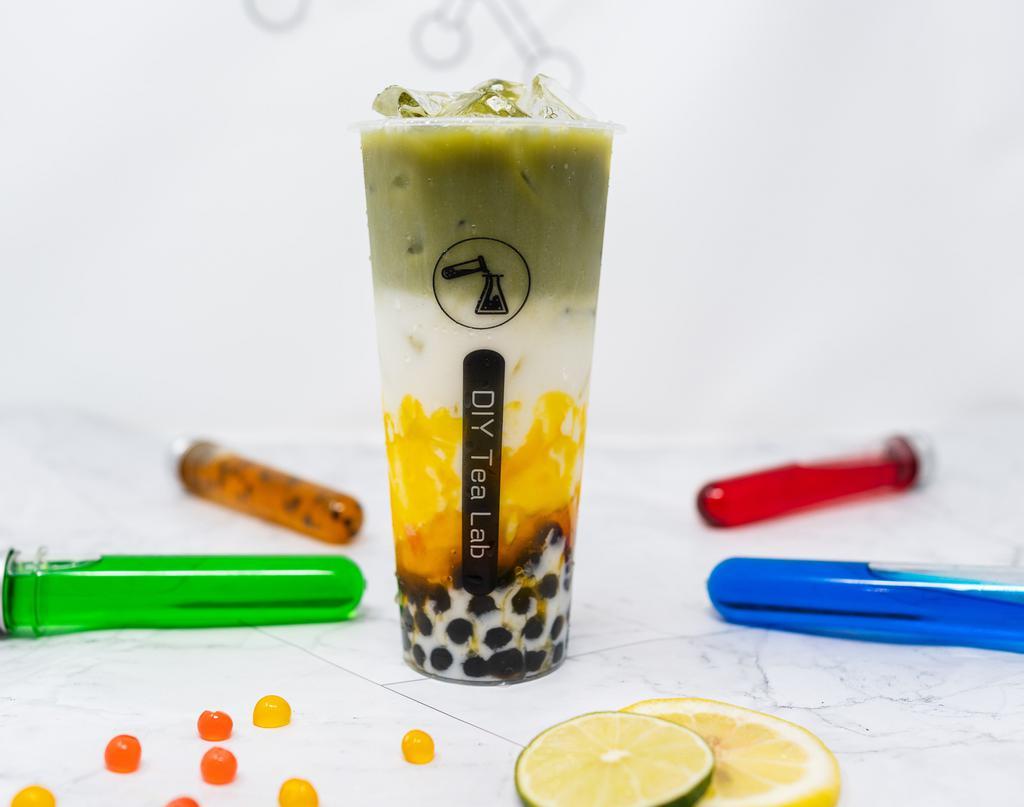 Mango Matcha Fresh Milk 芒果抹茶鲜奶` · organic matcha green tea,
fresh whole milk,
mango syrup,
tapioca boba recommended