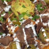 Irish Nachos · Perfectly fried ribbon fries topped with your choice of steak, corned beef, or grilled chick...