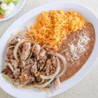 Carnitas Plate · Pork. Mexican style pork carnitas with rice, beans, salad, and tortillas.
