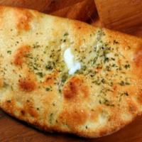 Chicken Bacon Ranch Calzone · Scratch-made ranch as the base, diced chicken, uncured bacon and mozzarella cheese.