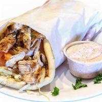 Chicken Shawarma Pita · Chicken breast marinated in our special Mediterranean seasonings, flame broiled on a vertica...
