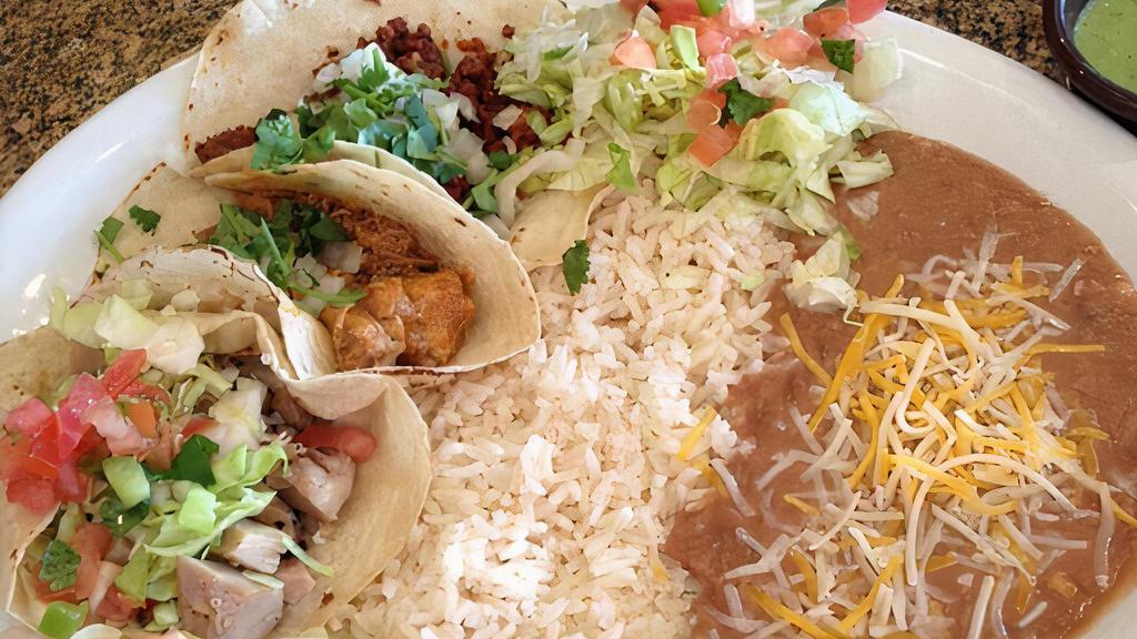 Taco Plate (3) · Gluten free. Choose your favorite combination of 3 mexican street tacos, served with rice and beans.