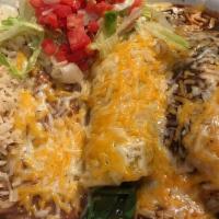 Enchiladas De Mole · Shredded chicken is folded inside three corn tortillas, topped with our mexican mole sauce. ...