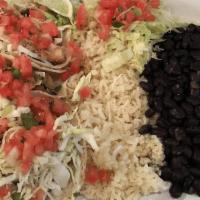 Baja Taco Plate · Your choice of two fish or shrimp tacos, served on a hand-made tortilla with crisp cabbage, ...