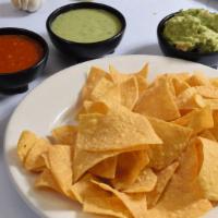 Chips & Salsa · Gluten free. Hot, hand-cut chips served with fresh home-made salsa.