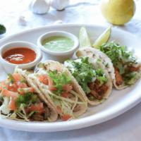 Mexican Street Taco(1) · Meat options: Pollo Asado, Machaca, Shredded Chicken, Chorizo, Pastor or Carnitas.