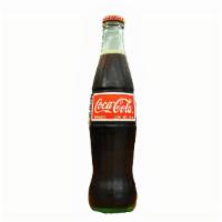 Mexican Coke (16.9 Oz) · Real cane-sugar. No high-fructose corn syrup.