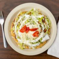 Big Sope · Deep fried masa shell topped with choice of meat, lettuce, tomato, sour cream and cheese.