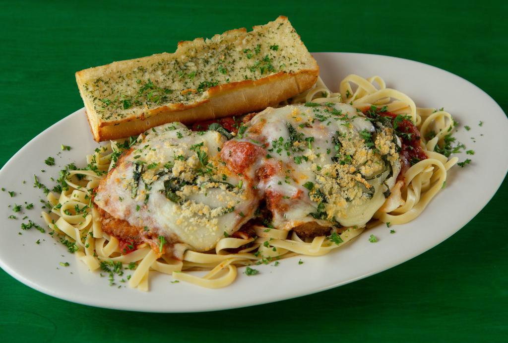 Jumbo Chick Parm · Huge all natural chicken breast served on a bed of fettuccine and topped with our homemade marinara, provolone and our four cheese blend.